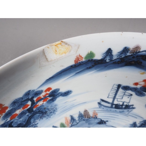 89 - Two Chinese blue and white bowls with later clobbered decoration, larger 8 1/2