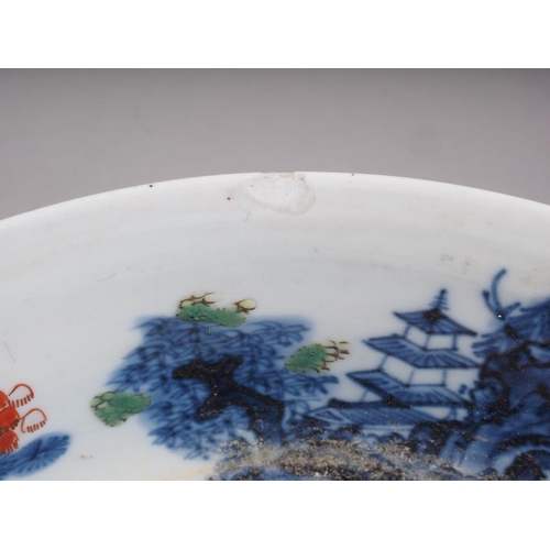 89 - Two Chinese blue and white bowls with later clobbered decoration, larger 8 1/2