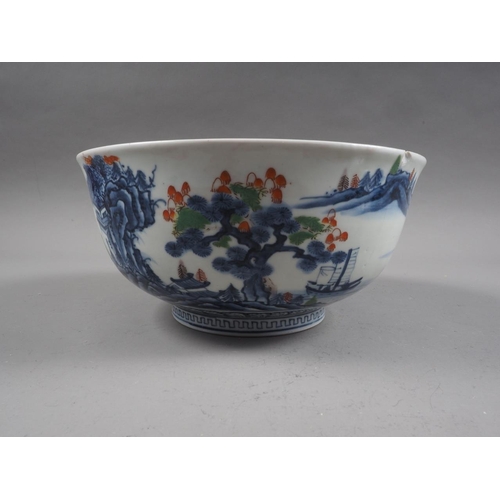 89 - Two Chinese blue and white bowls with later clobbered decoration, larger 8 1/2