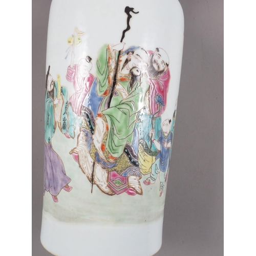 97 - A Chinese famille rose tapered vase with figures in a landscape decoration, 10 1/4