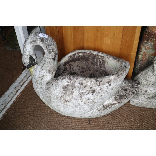 660 - A cast stone swan planter, 24