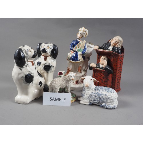 66 - A pair of Staffordshire model dogs, a similar pair of spill vases formed as sheep, two other model s... 