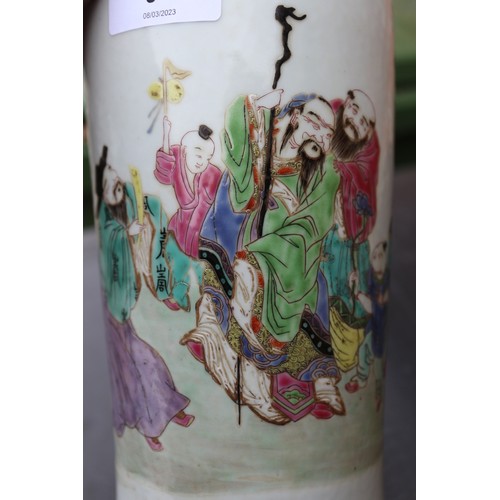 97 - A Chinese famille rose tapered vase with figures in a landscape decoration, 10 1/4