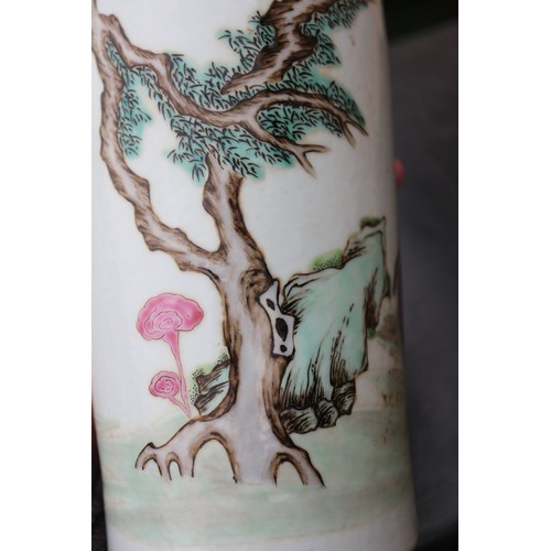 97 - A Chinese famille rose tapered vase with figures in a landscape decoration, 10 1/4