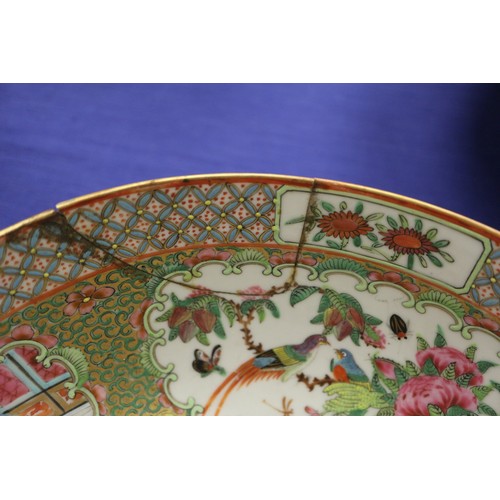 95 - A Chinese famille vert dish with Kylins in a landscape decoration, 11