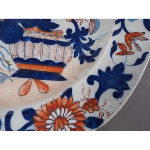 62 - A Continental shaped dish with floral decoration, 10