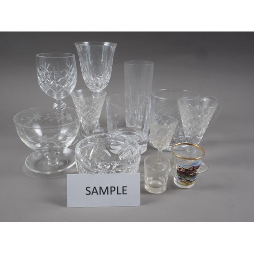 74 - A cut glass sherry decanter, three spirit decanters, a collection of cut glass sherries, port wines ... 