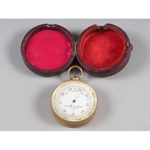 124 - A Negretti & Zambra pocket barometer, in fitted leather case