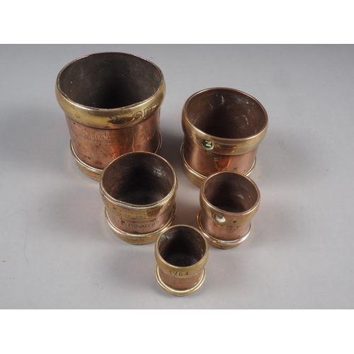 153 - A set of five copper and brass measures, 1 1/4