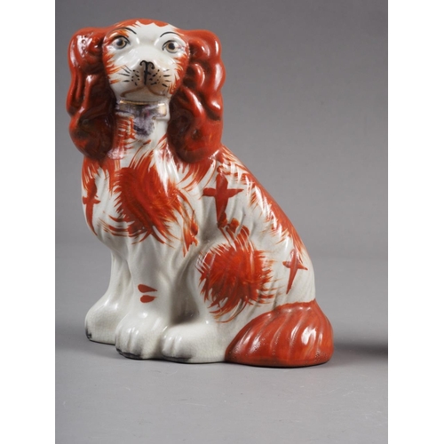 19 - A 19th century Staffordshire watch group with poodle and spaniels, 9