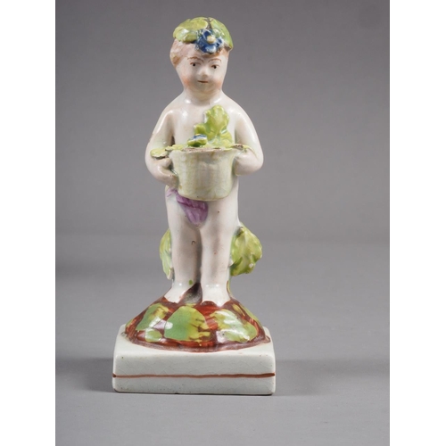 20 - A Derby porcelain cherub with basket of flowers, 4