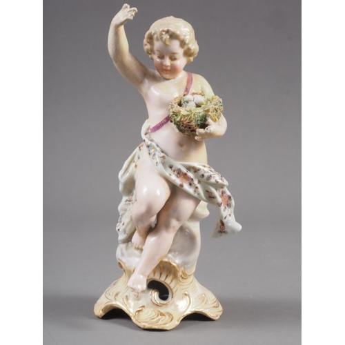 20 - A Derby porcelain cherub with basket of flowers, 4