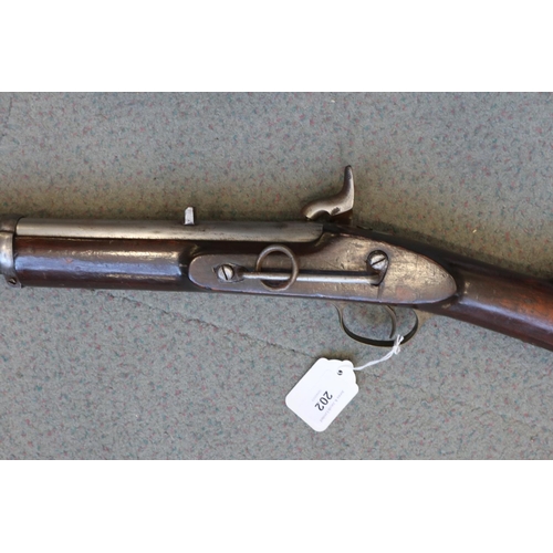 202 - A 19th century percussion cap cavalry musket stock, stamped 985, with captive ramrod, 37 1/2