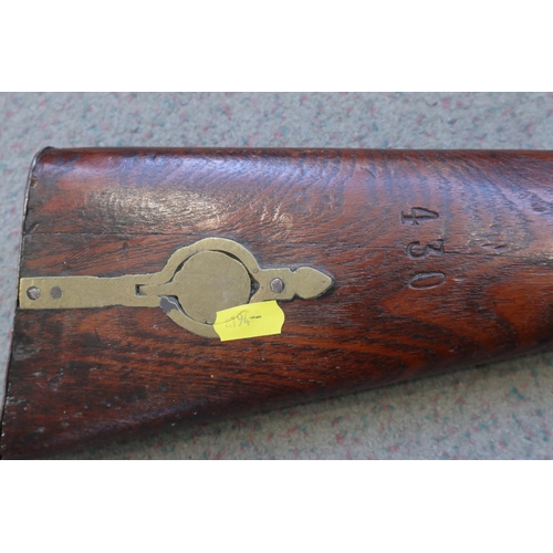 204 - A percussion cap musket stock, stamped 430 with ramrod, 43 1/2