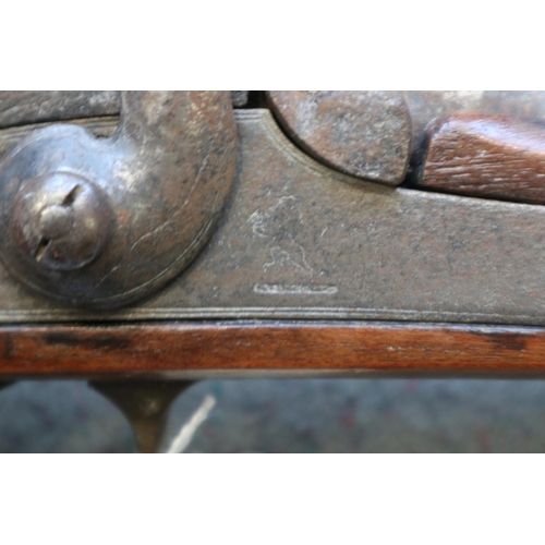 205 - A percussion cap musket with hardwood stock patched in copper, 42 3/4