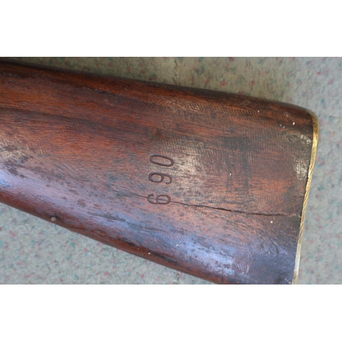 205 - A percussion cap musket with hardwood stock patched in copper, 42 3/4