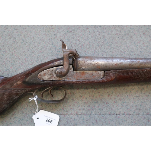 206 - A percussion cap double barrelled shotgun, 42 1/2