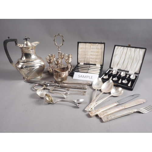 267 - A quantity of silver plated cutlery, a plated coffee pot and other items