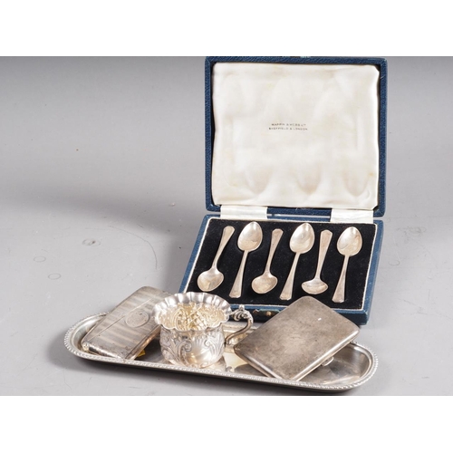 283 - A set of six Mappin & Webb teaspoons, in case, a silver tray, a cigarette case, a card case, an ... 