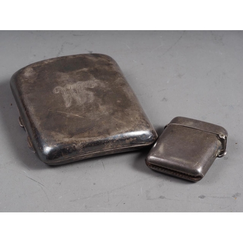 290 - A silver vesta case and a silver cigarette case, 2.3oz troy approx