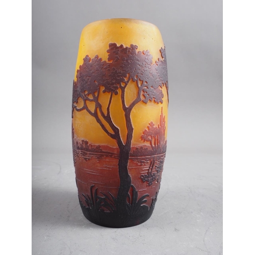 30 - A Daum Nancy overlaid and etched yellow ground cylinder vase with landscape decoration, 4 3/4