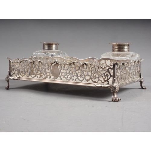 303 - A Godwin & Son silver ink stand with pierced decoration, 19.8oz troy approx, and two associated ... 