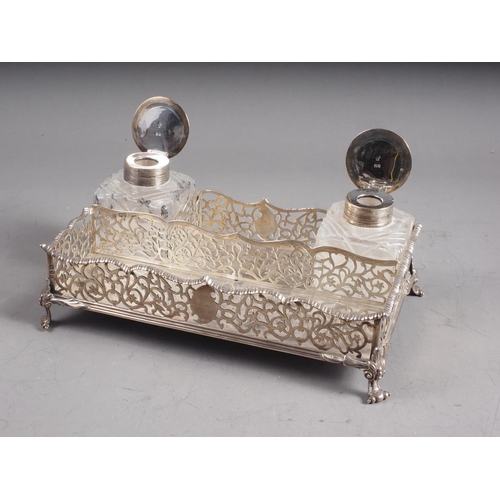 303 - A Godwin & Son silver ink stand with pierced decoration, 19.8oz troy approx, and two associated ... 