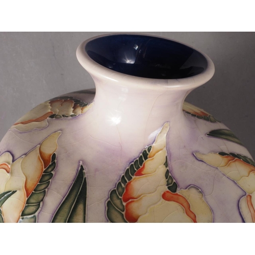 8 - A Moorcroft iris pattern baluster vase, 12