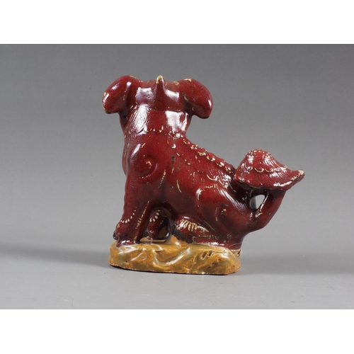 88 - A 19th century Chinese red and yellow glazed pottery Dog of Fo, 7