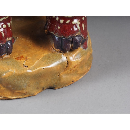 88 - A 19th century Chinese red and yellow glazed pottery Dog of Fo, 7