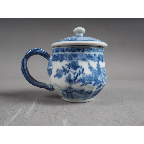 101 - A Chinese blue and white bowl with flower and scrolled decoration, and seal mark to base, 4