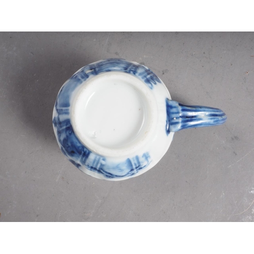 101 - A Chinese blue and white bowl with flower and scrolled decoration, and seal mark to base, 4