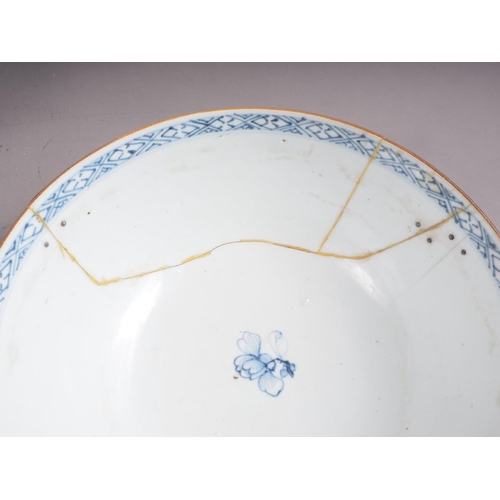 101 - A Chinese blue and white bowl with flower and scrolled decoration, and seal mark to base, 4