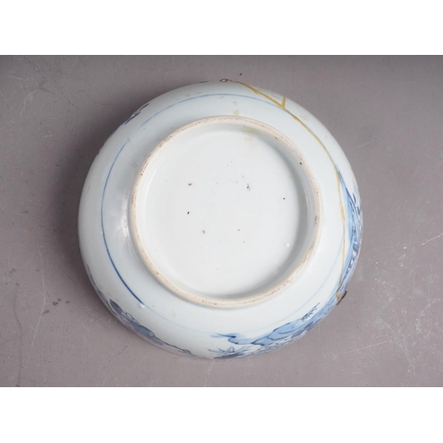 101 - A Chinese blue and white bowl with flower and scrolled decoration, and seal mark to base, 4