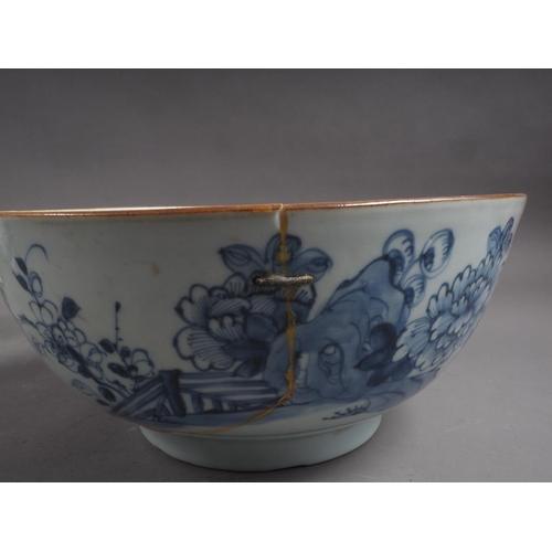 101 - A Chinese blue and white bowl with flower and scrolled decoration, and seal mark to base, 4