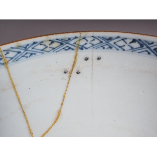 101 - A Chinese blue and white bowl with flower and scrolled decoration, and seal mark to base, 4