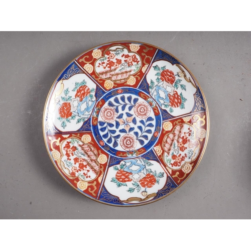 102 - A Chinese shaped Imari plate with mythical beast decoration, 8 1/4