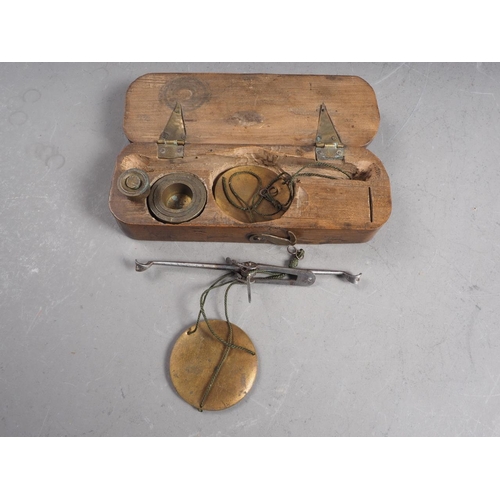 128 - An 18th century brass and steel balance, in fruitwood case, monogrammed WL, case 4 1/2