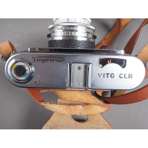 135 - A Voiglander Vitor CLR camera, in travel case, and three other cameras