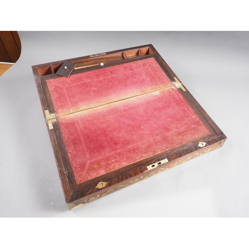 159 - A 19th century rosewood and brass inlaid writing box with part fitted interior, 20