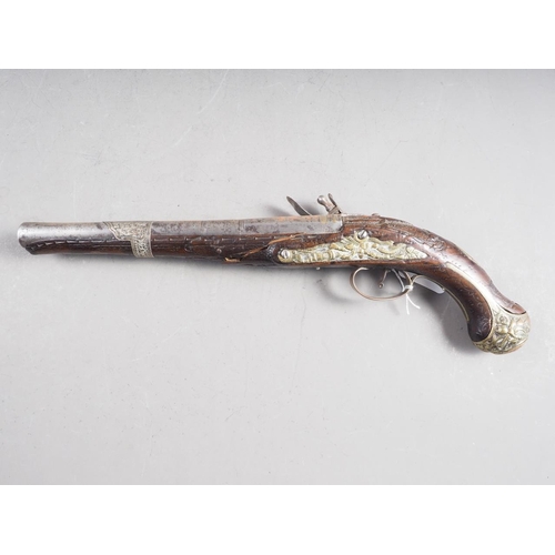 197 - A 19th century walnut stock, brass and white metal mounted flintlock pistol, 17