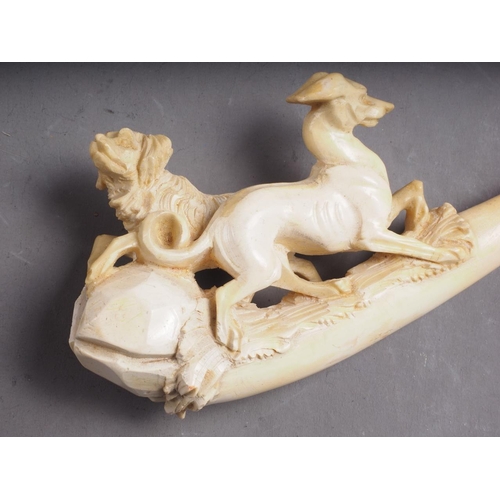 232 - A 19th century meerschaum pipe, carved with dogs, 4 3/4