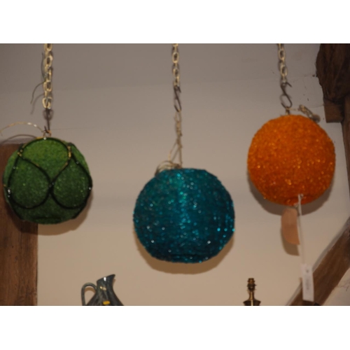 250 - A 1970s green resin globular light fitting, a similar turquoise light fitting and a similar orange l... 