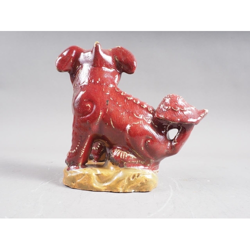 88 - A 19th century Chinese red and yellow glazed pottery Dog of Fo, 7