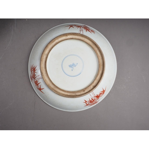 96 - A Chinese famille verte dish with warrior decoration, 12 3/4