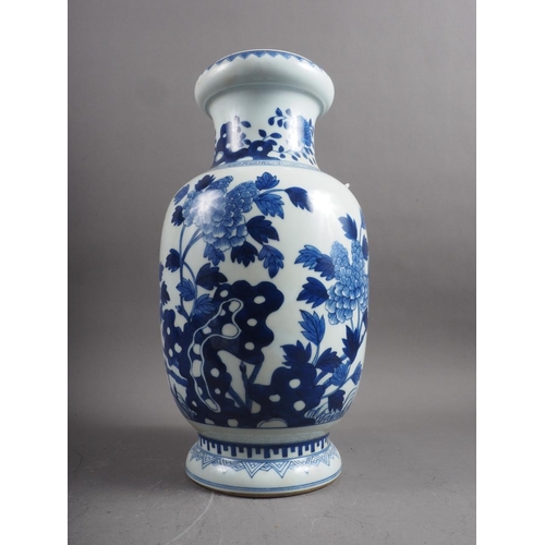 99 - A Chinese blue and white baluster vase with floral and landscape decoration, 14 1/4