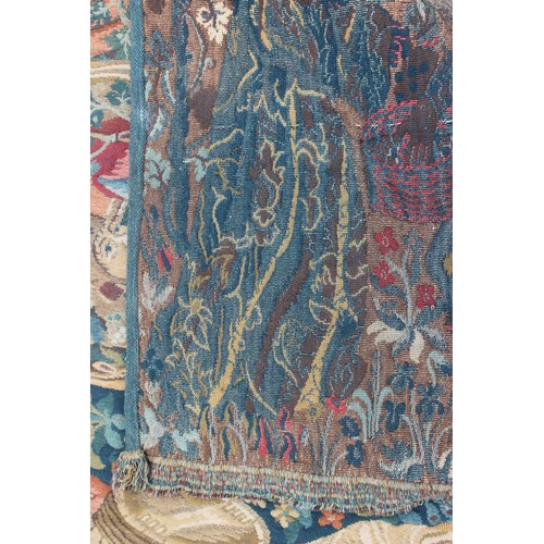 158 - A Jacquard woven tapestry with figures in a landscape design, 73 1/2