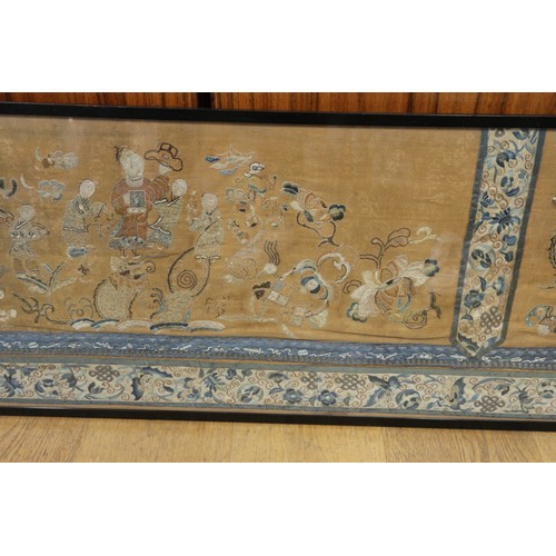 107 - A Chinese silk embroidered triple panel with figures on a yellow ground and blue butterfly and flowe... 