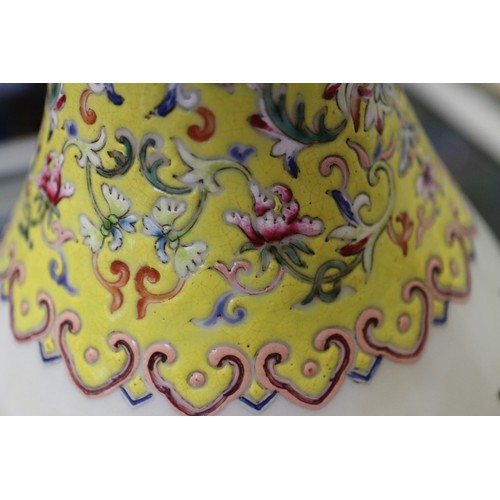 91 - A Chinese famille rose baluster vase with flower, tree and rock decoration, and seal mark to base, 1... 