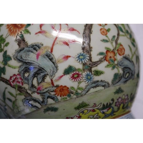 91 - A Chinese famille rose baluster vase with flower, tree and rock decoration, and seal mark to base, 1... 